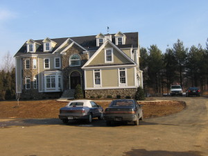 2-story stone and vinyl modular home