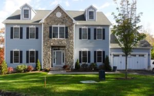 2-story stone and vinyl modular home